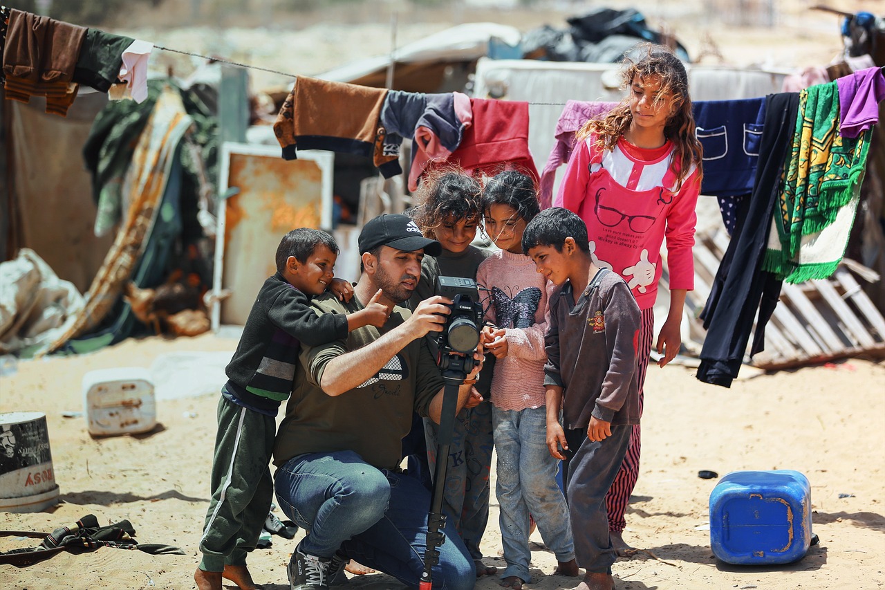 man, cameraman, children